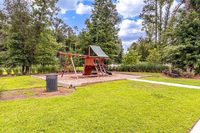 community jungle gym with a yard