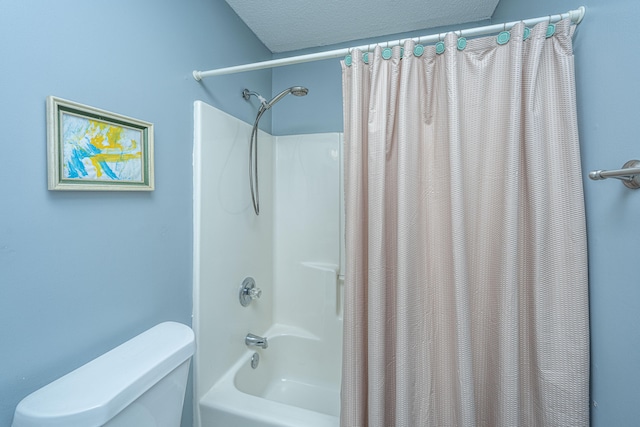 bathroom featuring shower / tub combo, a textured ceiling, and toilet