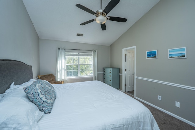 bedroom with ceiling fan, carpet, and high vaulted ceiling