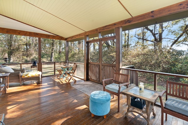 sunroom with wood ceiling and vaulted ceiling