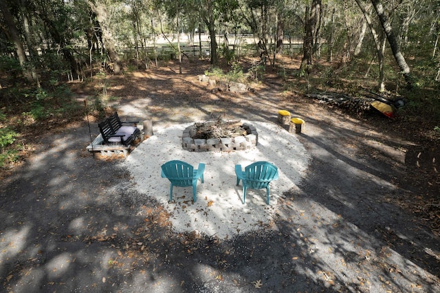 exterior space featuring an outdoor fire pit