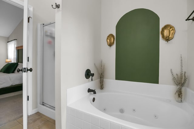 bathroom with a jetted tub, tile patterned flooring, connected bathroom, and a shower stall