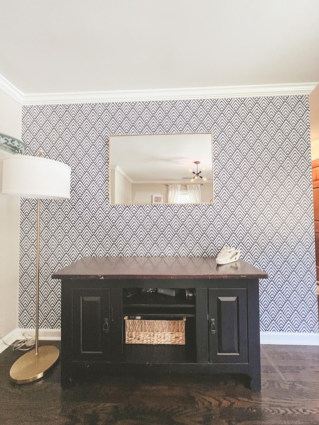 bathroom with crown molding, ceiling fan, and hardwood / wood-style flooring