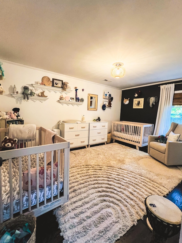 bedroom with crown molding