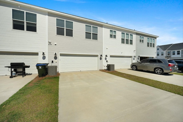 148 Omalley Dr, Summerville, SC 29483 - view of side of property with an attached garage, central AC, and concrete driveway