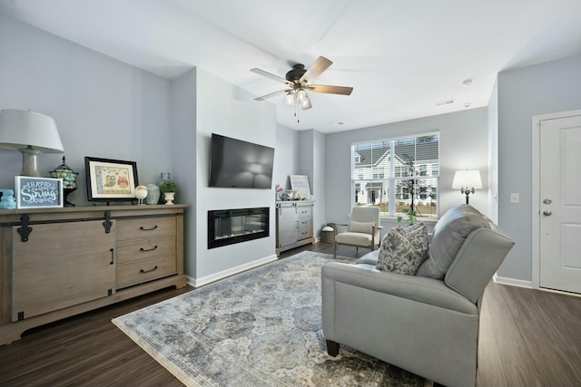 148 Omalley Dr, Summerville, SC 29483 - living area with a ceiling fan, a glass covered fireplace, baseboards, and dark wood finished floors