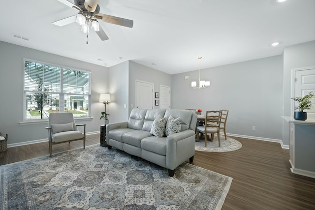 148 Omalley Dr, Summerville, SC 29483 - living room featuring baseboards, visible vents, ceiling fan with notable chandelier, and dark wood finished floors