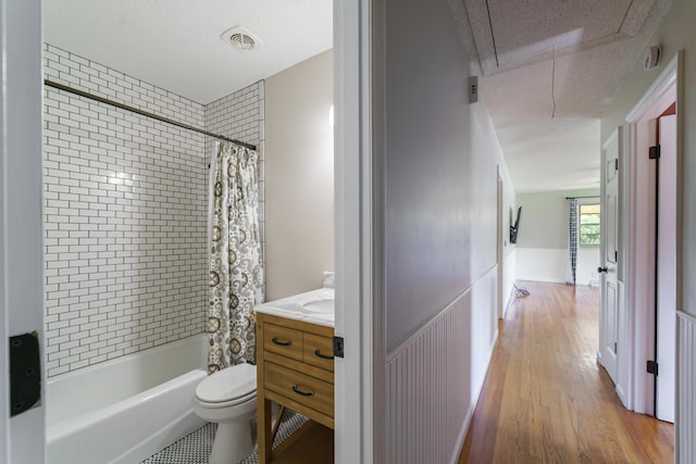 7 Plainfield Dr, Charleston, SC 29407 - full bathroom with vanity, shower / bath combo with shower curtain, a wainscoted wall, and wood finished floors