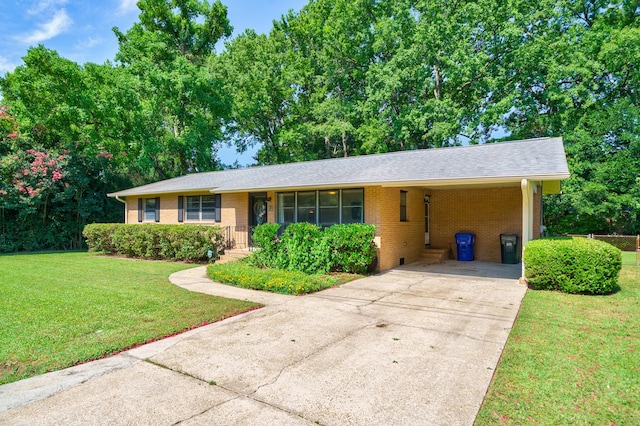 7 Plainfield Dr, Charleston, SC 29407 - ranch-style house with brick siding, driveway, a front lawn, and a carport