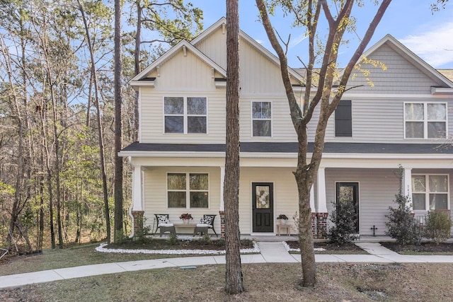 view of front of property featuring covered porch