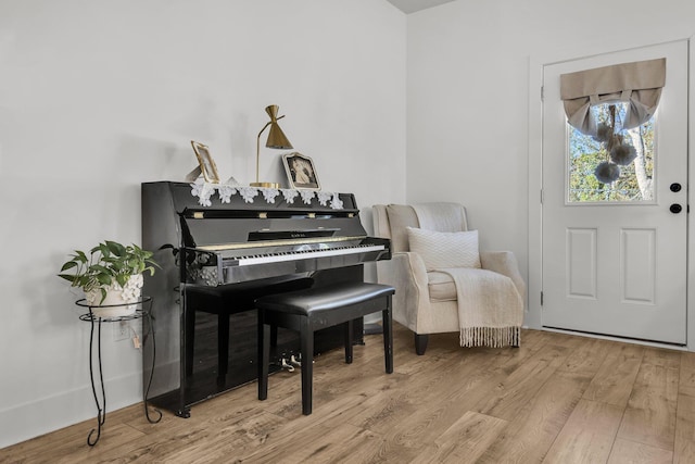 sitting room featuring wood finished floors