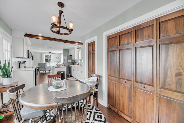 dining room with recessed lighting, dark wood-style flooring, and ceiling fan with notable chandelier