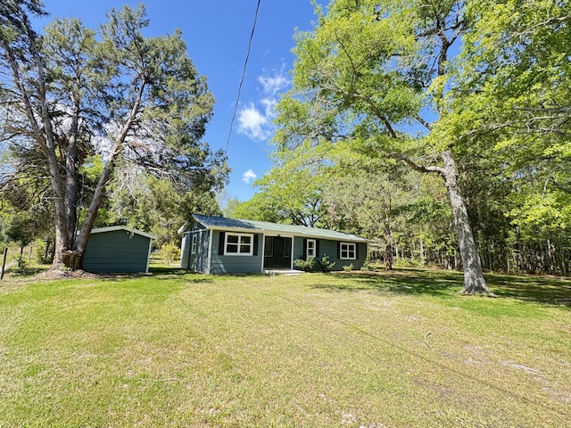 view of front of house with a front lawn