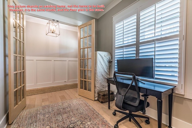 office with french doors, ornamental molding, and hardwood / wood-style flooring