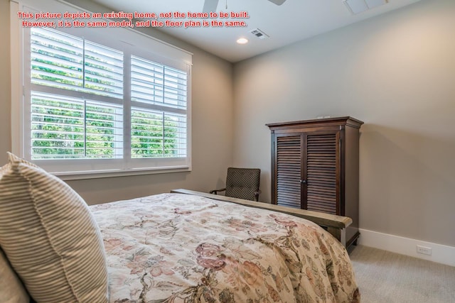 bedroom with multiple windows, light carpet, and ceiling fan