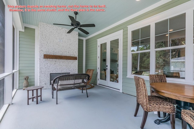 sunroom / solarium with french doors and ceiling fan