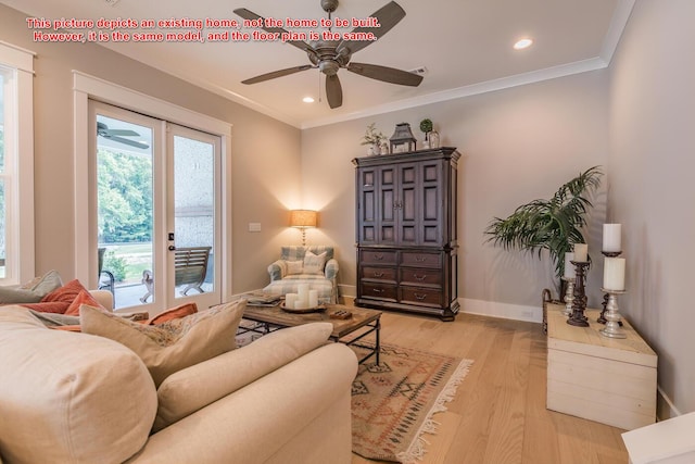 living area with ornamental molding, ceiling fan, and light hardwood / wood-style floors