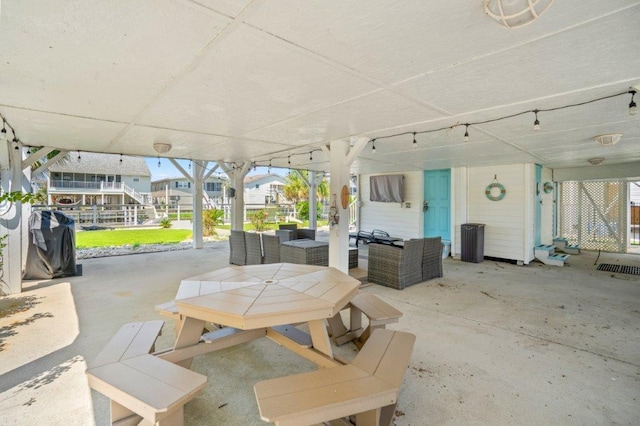 325 N 58th Ave, North Myrtle Beach, SC 29582 - view of patio with outdoor dining area, an outdoor living space, and a grill