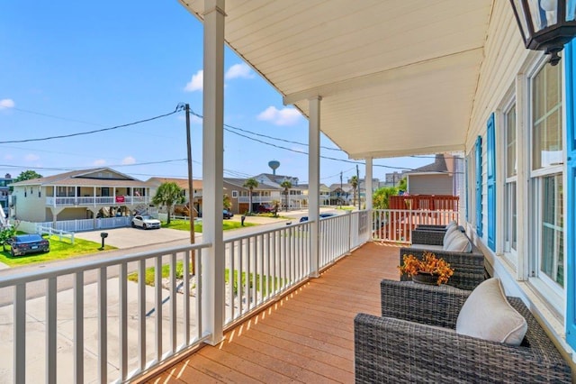 325 N 58th Ave, North Myrtle Beach, SC 29582 - porch featuring a residential view