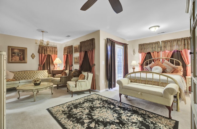 sitting room featuring light carpet and ceiling fan