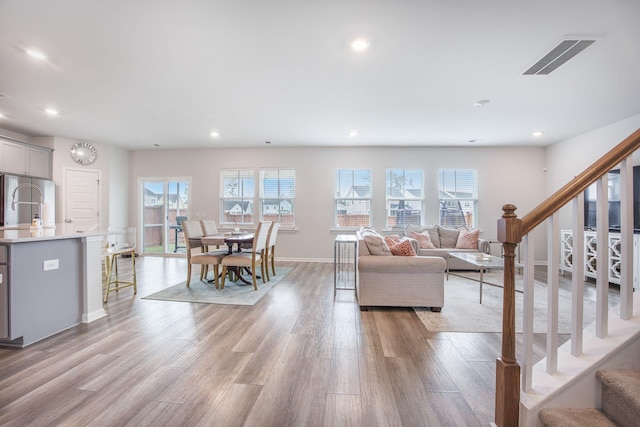 533 Richfield Way, Summerville, SC 29486 - living room featuring recessed lighting, light wood-type flooring, stairs, and visible vents