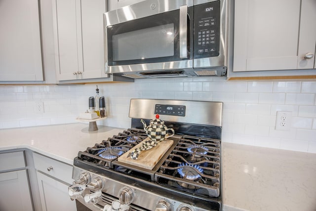 533 Richfield Way, Summerville, SC 29486 - kitchen with light stone counters, appliances with stainless steel finishes, and backsplash