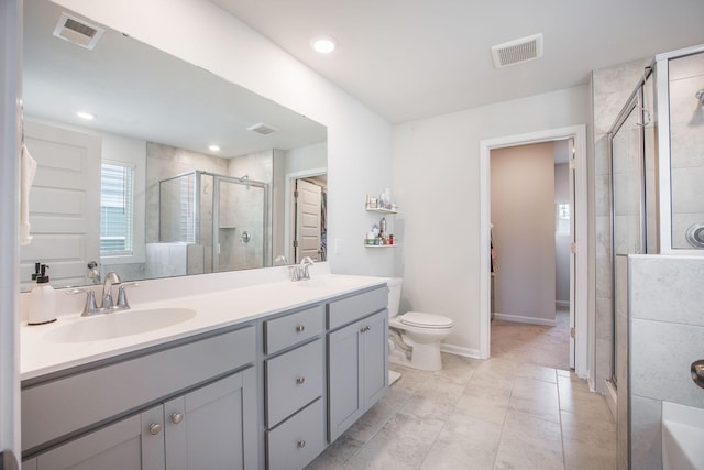 533 Richfield Way, Summerville, SC 29486 - bathroom featuring double vanity, visible vents, a shower stall, and a sink