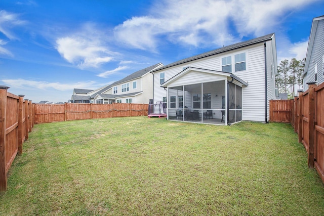 533 Richfield Way, Summerville, SC 29486 - rear view of house featuring a lawn, a fenced backyard, and a sunroom