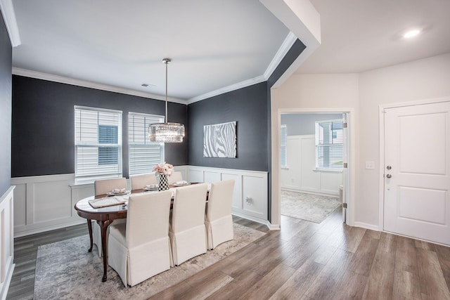 533 Richfield Way, Summerville, SC 29486 - dining space with ornamental molding, light wood-style flooring, a decorative wall, and a wainscoted wall