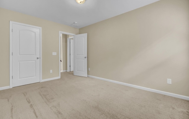 unfurnished bedroom featuring carpet floors