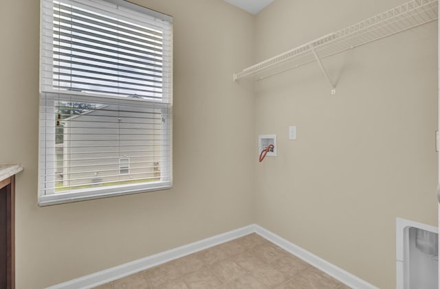 laundry room with a wealth of natural light and hookup for a washing machine