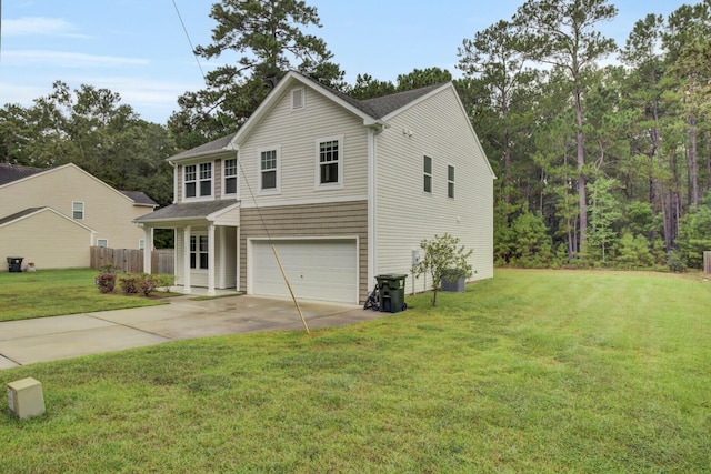 view of front facade with a garage and a front lawn