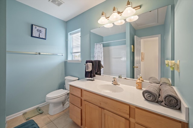 bathroom featuring tile patterned floors, a shower with curtain, vanity, and toilet