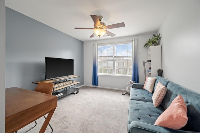 carpeted living room featuring ceiling fan