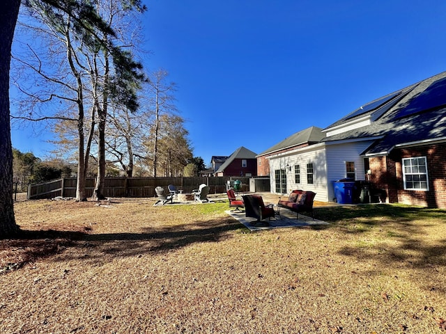 view of yard with a patio and a fire pit