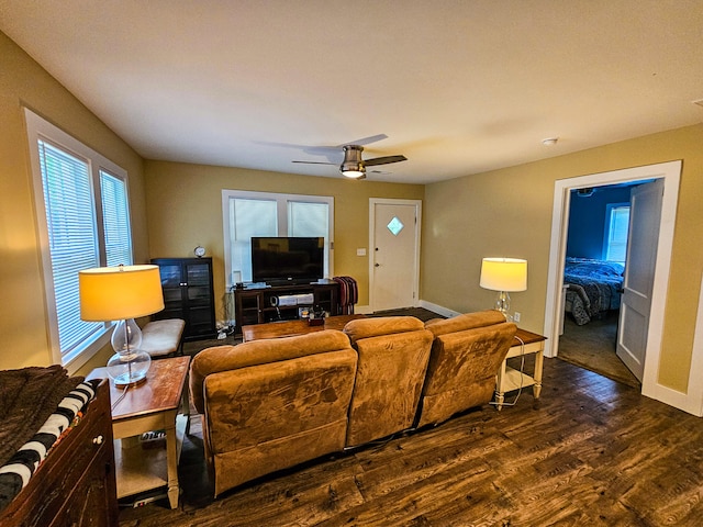 living room with hardwood / wood-style floors and ceiling fan