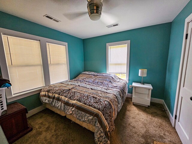 carpeted bedroom featuring ceiling fan