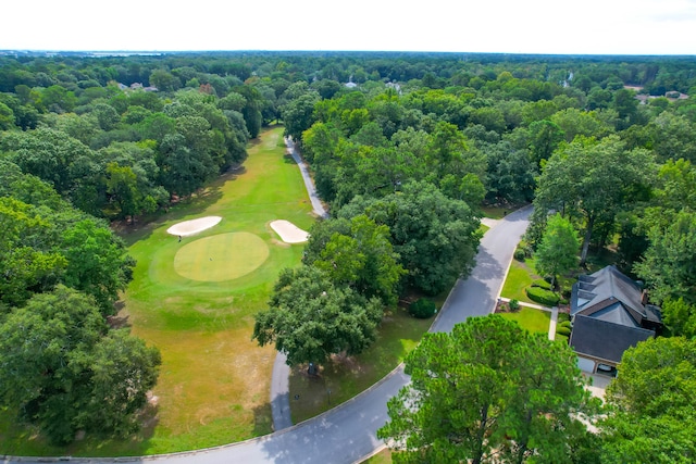 drone / aerial view featuring a view of trees