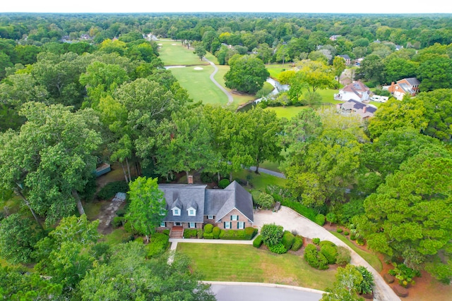 aerial view featuring a view of trees