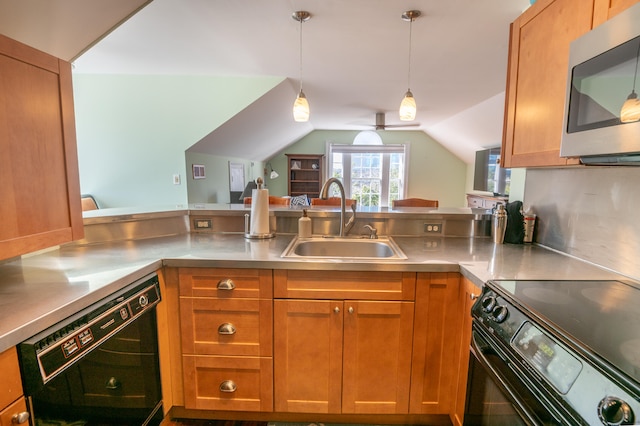 kitchen with stainless steel counters, vaulted ceiling, sink, hanging light fixtures, and black appliances