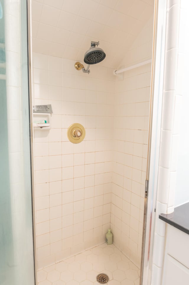 bathroom with vanity and an enclosed shower