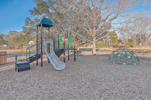 community jungle gym with fence