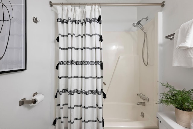full bathroom with shower / tub combo with curtain
