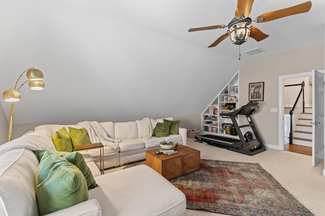 1324 Southlake Dr, Mount Pleasant, SC 29464 - carpeted living room featuring visible vents, baseboards, ceiling fan, stairway, and lofted ceiling