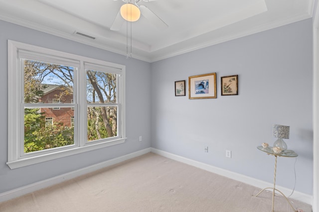 1324 Southlake Dr, Mount Pleasant, SC 29464 - empty room featuring a tray ceiling, a ceiling fan, light carpet, baseboards, and visible vents