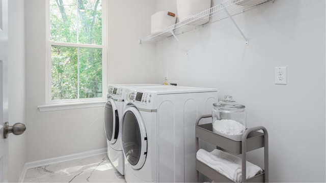 washroom featuring independent washer and dryer