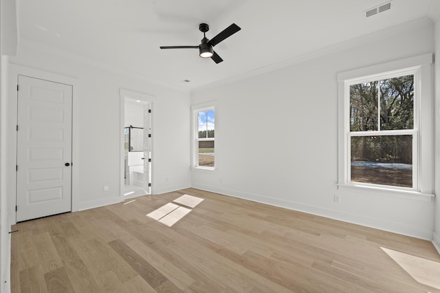100 E Carolina Ave, Summerville, SC 29483 - spare room with plenty of natural light, light wood finished floors, a ceiling fan, and baseboards