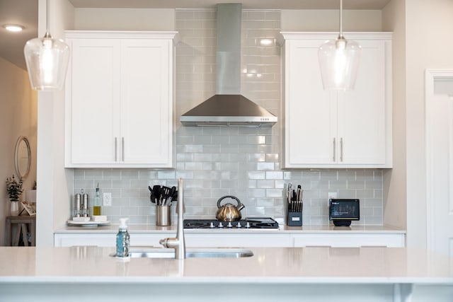291 Lucca Dr, Summerville, SC 29486 - kitchen featuring wall chimney exhaust hood, light countertops, and white cabinets
