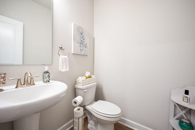 291 Lucca Dr, Summerville, SC 29486 - half bath featuring a sink and wood finished floors