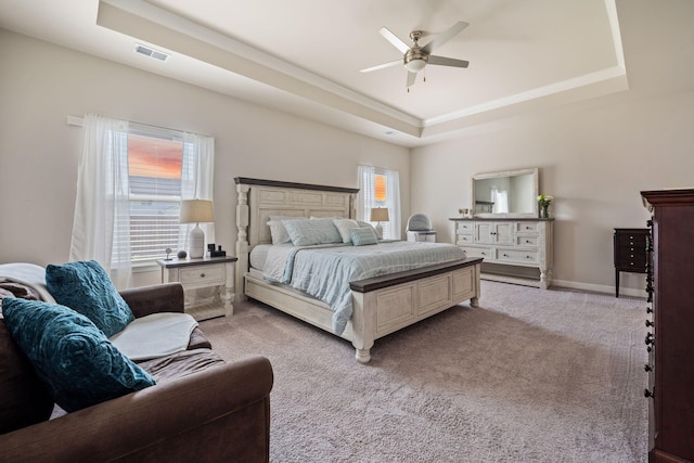 291 Lucca Dr, Summerville, SC 29486 - bedroom featuring a raised ceiling, light colored carpet, a ceiling fan, and ornamental molding